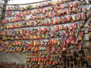 Masks in the market at Chichicastenango in Guatemala. Photo by Barbara Borst